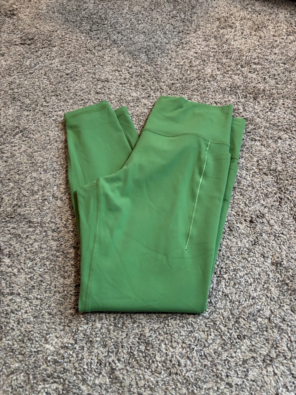 Athleta Transcend Stash Leggings size large (24.5”)